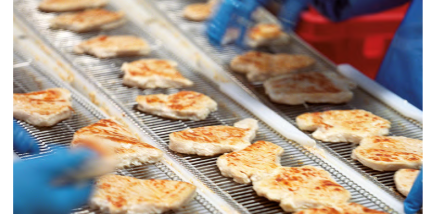 Hygienically flawless meat production on a conveyor belt